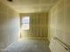 Neutral bedroom with a bright window featuring smooth walls, perfect for customization at 11626 N Stanton Ln, Maricopa, AZ 85139