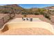 Private backyard with patio, seating area, and desert landscaping for low maintenance appeal at 1926 E Siesta Ln, Phoenix, AZ 85024