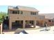 Inviting backyard patio with shade structure, offering a comfortable outdoor living space with ample seating at 1926 E Siesta Ln, Phoenix, AZ 85024