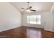 Bright bedroom with hardwood floors, vaulted ceiling and beautiful window view at 1926 E Siesta Ln, Phoenix, AZ 85024