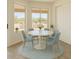 Bright breakfast nook featuring a round table and window views at 1926 E Siesta Ln, Phoenix, AZ 85024