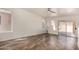 This well-lit living room offers tile floors and a view of the patio and backyard at 1926 E Siesta Ln, Phoenix, AZ 85024