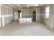 Spacious room ready for customization, featuring fresh drywall and ample natural light at 46923 W Old Timer Rd, Maricopa, AZ 85139
