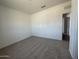 This bedroom has a closet and a carpeted floor providing a cozy and inviting atmosphere at 46963 W Coe St, Maricopa, AZ 85139