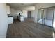 Open concept living area features tile floors and a kitchen with modern appliances at 46963 W Coe St, Maricopa, AZ 85139