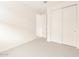Bedroom with neutral carpet and closet with sliding doors at 4994 W Hunter Trl, San Tan Valley, AZ 85144