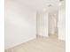 Bright bedroom featuring a light wood floors, and neutral paint at 4994 W Hunter Trl, San Tan Valley, AZ 85144