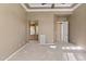 Main bedroom with ensuite access and neutral carpeting at 12377 W Desert Vista Trl, Peoria, AZ 85383