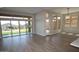 Bright living room with expansive sliding glass doors merging indoor comfort with outdoor beauty at 32513 N 135Th Dr, Peoria, AZ 85383