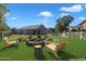 Backyard with firepit, pool, and seating at 2020 S Sabrina --, Mesa, AZ 85209