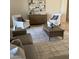 Bright living room with neutral furniture, patterned area rug and stylish accessories at 3076 E La Costa Dr, Gilbert, AZ 85298
