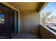 Balcony overlooking the parking area and a door to an external storage area at 4925 E Desert Cove Ave # 350, Scottsdale, AZ 85254