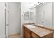 Bathroom boasting a vanity, sink, mirror, and direct access to a linen closet at 4925 E Desert Cove Ave # 350, Scottsdale, AZ 85254