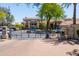 Gated community entrance ensures privacy and security with lush landscaping and well-maintained grounds at 4925 E Desert Cove Ave # 350, Scottsdale, AZ 85254