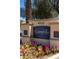 Elegant community signage, Tuscany Villas Condominium Homes, surrounded by colorful flowers and landscaping at 4925 E Desert Cove Ave # 350, Scottsdale, AZ 85254