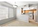 Bright dining area with a window view and a convenient pass-through to the adjacent kitchen at 4925 E Desert Cove Ave # 350, Scottsdale, AZ 85254
