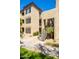 Exterior view showcasing the modern architectural design with stairs leading to upper-level apartment homes at 4925 E Desert Cove Ave # 350, Scottsdale, AZ 85254