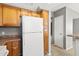 Bright kitchen featuring ample cabinet space and a full-size refrigerator at 4925 E Desert Cove Ave # 350, Scottsdale, AZ 85254