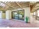 Outdoor patio area with a pergola, red brick pavers, and access to the backyard at 2107 S Paseo Loma --, Mesa, AZ 85202