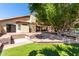 Large backyard featuring a patio, pergola, outdoor living space, and mature trees at 2107 S Paseo Loma --, Mesa, AZ 85202