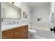 Cozy bathroom featuring stylish vanity with stone countertop and modern fixtures at 2107 S Paseo Loma --, Mesa, AZ 85202