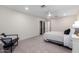 Spacious bedroom with soft carpeting, ceiling fan and a walk-in closet at 2107 S Paseo Loma --, Mesa, AZ 85202