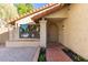 Charming home exterior showcasing the front entrance with a tiled walkway and manicured landscaping at 2107 S Paseo Loma --, Mesa, AZ 85202