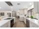 Well-lit kitchen featuring stainless steel appliances, a large island, and an open layout at 2107 S Paseo Loma --, Mesa, AZ 85202