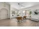 Bright living room featuring vaulted ceilings, light wood flooring, and contemporary furniture at 2107 S Paseo Loma --, Mesa, AZ 85202