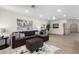 Spacious living room featuring light wood flooring, neutral tones, and contemporary decor at 2107 S Paseo Loma --, Mesa, AZ 85202