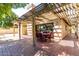 Covered patio with dining furniture, perfect for outdoor entertaining and relaxation at 2107 S Paseo Loma --, Mesa, AZ 85202