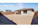 Spacious backyard featuring a covered patio ideal for outdoor seating and entertaining guests at 16923 W Siesta Way, Goodyear, AZ 85338