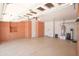 Garage with epoxy floors, built in cabinets, water filtration system and water heater at 27789 N 129Th Ln, Peoria, AZ 85383
