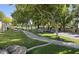 This street is a picturesque, tree-lined street in Circle G Ranches with sidewalks and meticulously maintained landscaping at 2166 E Caroline Ln, Tempe, AZ 85284