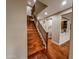 Elegant wooden staircase leading to upper level at 19428 W Colter St, Litchfield Park, AZ 85340