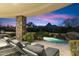 Stunning pool and spa area with mountain views and comfortable seating at 27264 N 103Rd Way, Scottsdale, AZ 85262