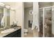 Clean bathroom with granite vanity and shower at 27264 N 103Rd Way, Scottsdale, AZ 85262