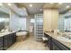 Spacious bathroom with and vanities and a glass shower at 27264 N 103Rd Way, Scottsdale, AZ 85262