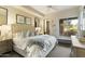 Spacious bedroom with large window and neutral decor at 27264 N 103Rd Way, Scottsdale, AZ 85262
