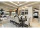 Bright dining room with hardwood floors and large windows at 27264 N 103Rd Way, Scottsdale, AZ 85262