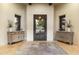 Elegant entryway with ornate door and wooden consoles at 27264 N 103Rd Way, Scottsdale, AZ 85262