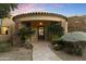 Inviting home exterior with stone accents and a landscaped walkway at 27264 N 103Rd Way, Scottsdale, AZ 85262