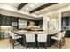 Gourmet kitchen with large island, granite countertops, and stainless steel appliances at 27264 N 103Rd Way, Scottsdale, AZ 85262