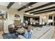 Open living space with kitchen, fireplace and comfortable seating at 27264 N 103Rd Way, Scottsdale, AZ 85262