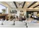 Open living area with kitchen, fireplace and comfortable seating at 27264 N 103Rd Way, Scottsdale, AZ 85262