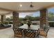 Outdoor patio with stone flooring, seating area, and mountain views at 27264 N 103Rd Way, Scottsdale, AZ 85262