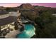 Luxury pool and spa with mountain views and patio furniture at 27264 N 103Rd Way, Scottsdale, AZ 85262