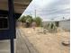 Backyard showcasing mature trees, landscaping, and a mix of block and wood fencing at 4232 W Citrus Way, Phoenix, AZ 85019