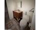 Bathroom with a granite vanity, toilet, and decorative tiled floor at 4232 W Citrus Way, Phoenix, AZ 85019