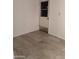 This bedroom has white walls and tile flooring at 4232 W Citrus Way, Phoenix, AZ 85019